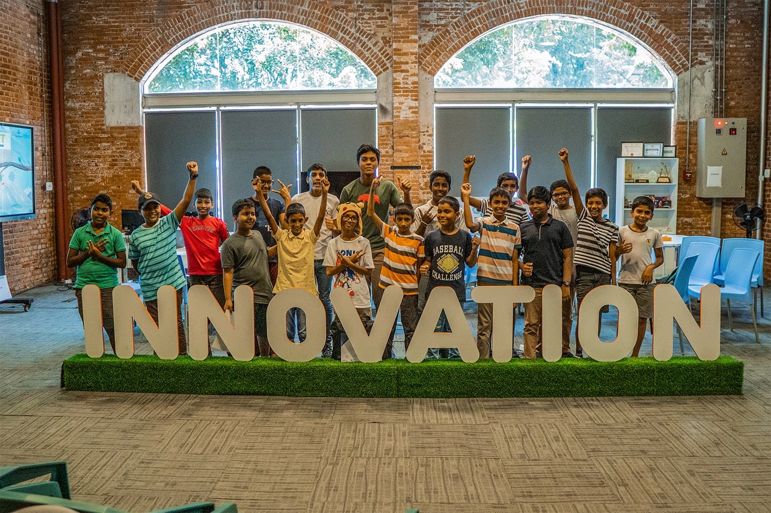 Group cheering at innovation event